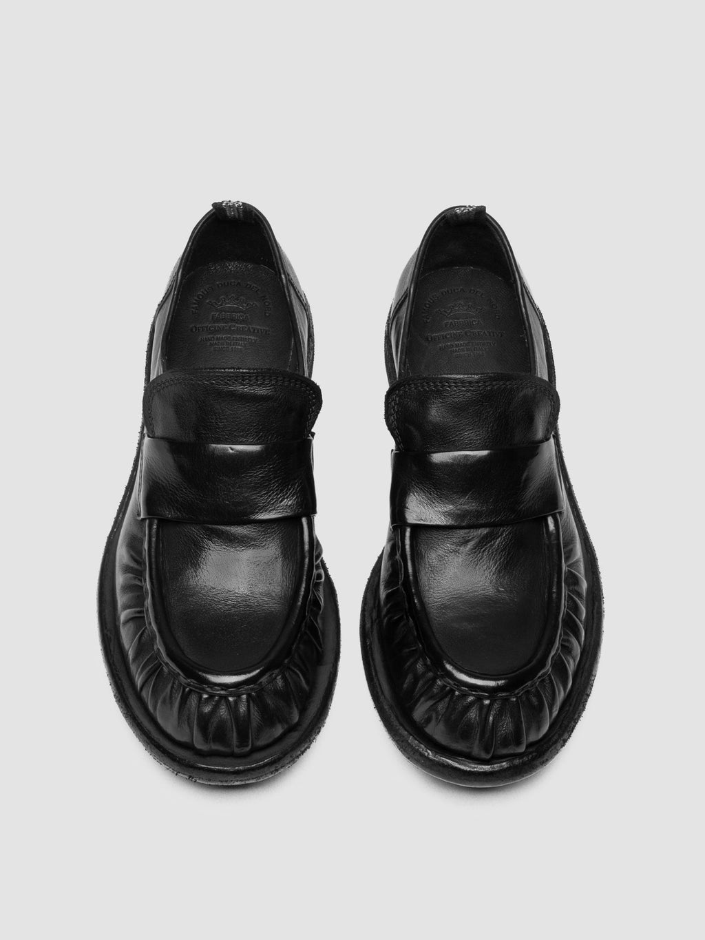 RUGGED 123_W - Black Leather Penny Loafers - image 2,side view